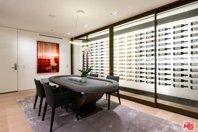 a view of a dining room with furniture and window