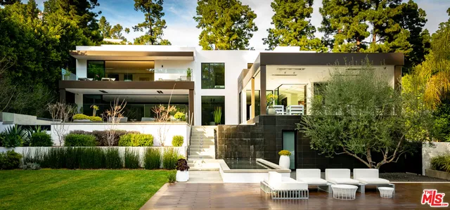 a view of house with yard