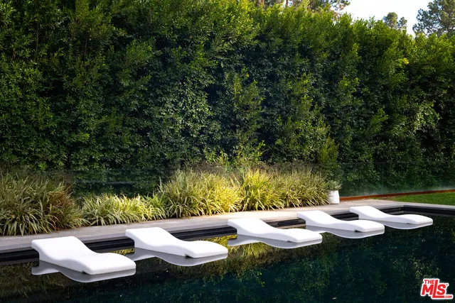 a view of an outdoor space with furniture