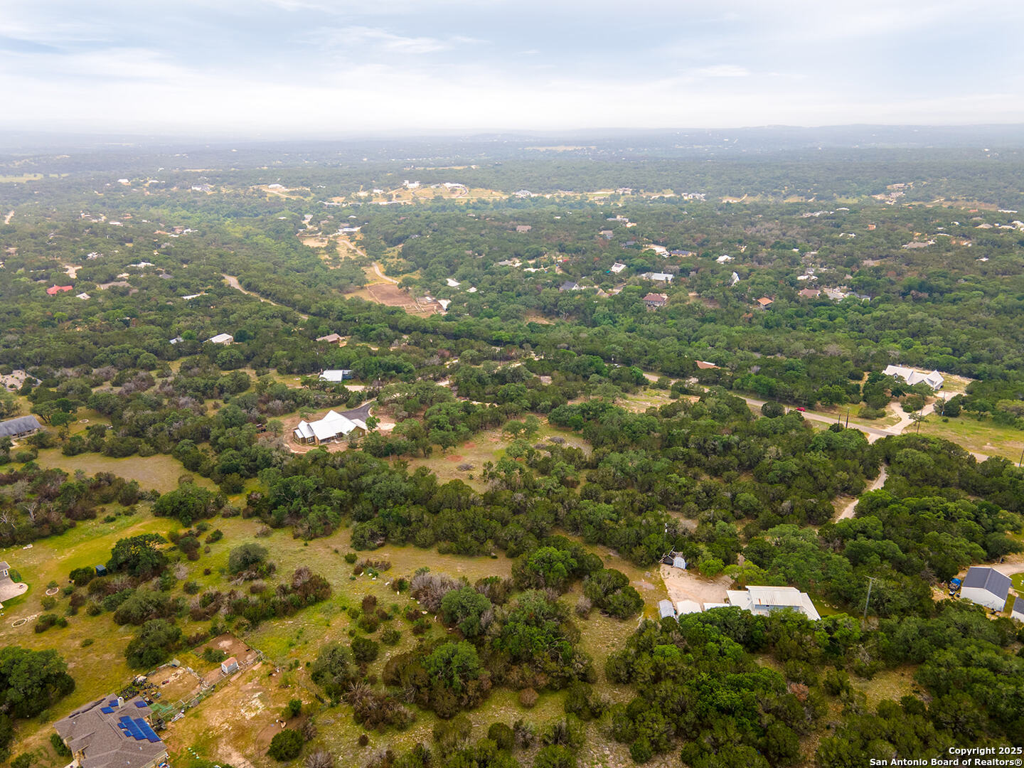 5028 Tanglewood Trail Spring Branch, TX 78070 - Photo 12 of 14 an aerial view of residential houses with city view