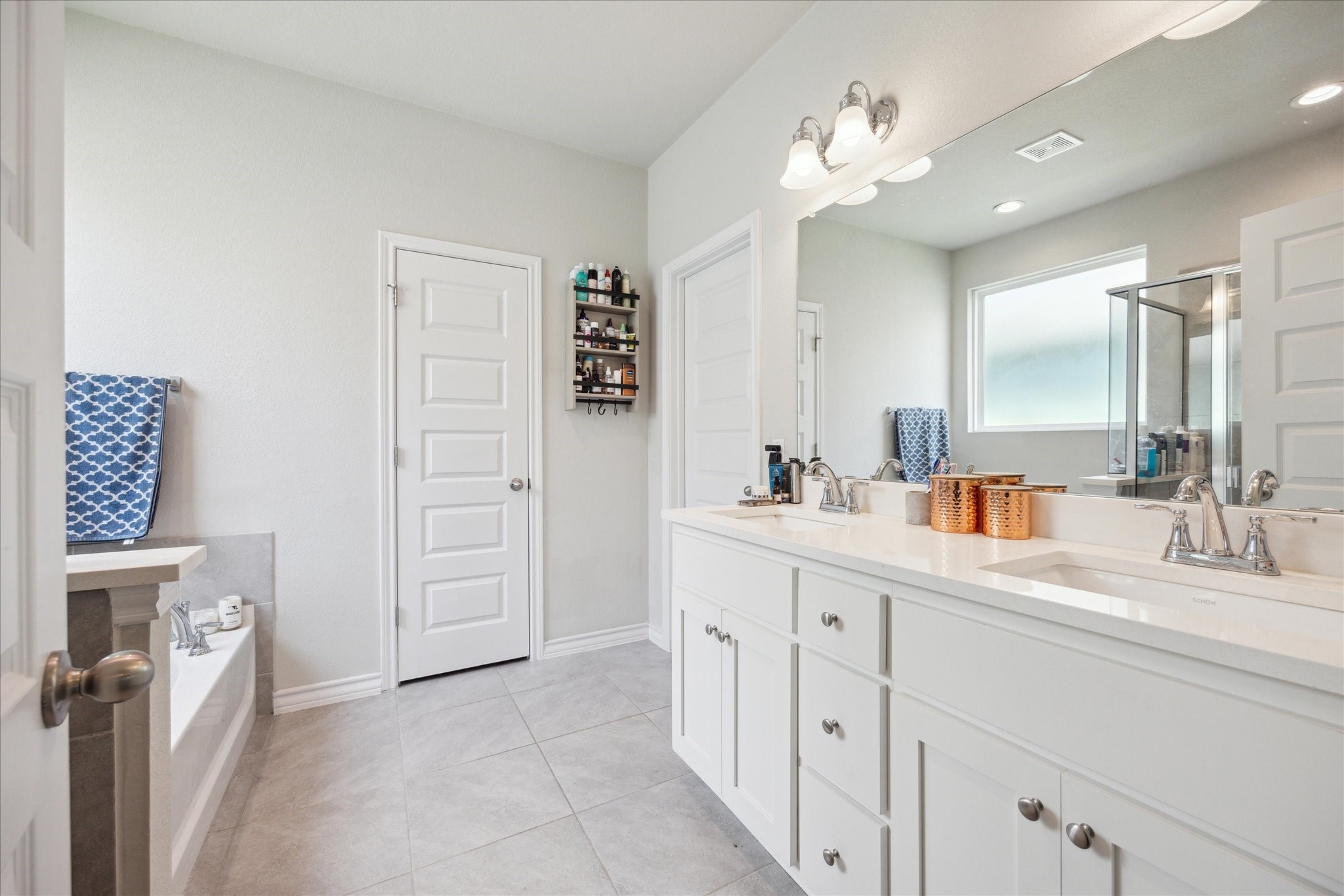 2005 Jacey Way Austin, TX 78725 - Photo 6 of 17 Primary bath with tub and shower