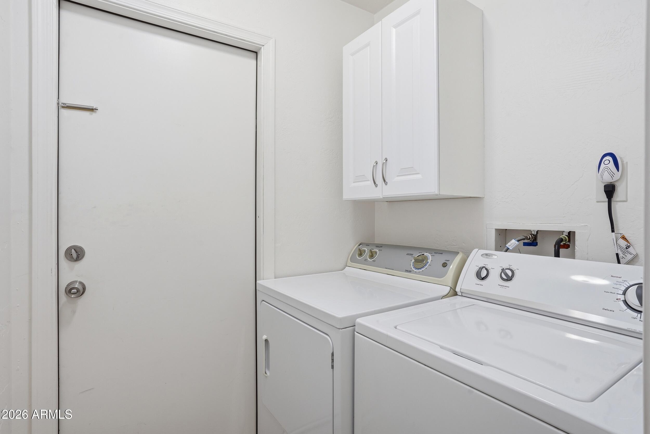 6334 East Albany Street Mesa, AZ 85205 - Photo 56 of 72 a utility room with dryer and washer