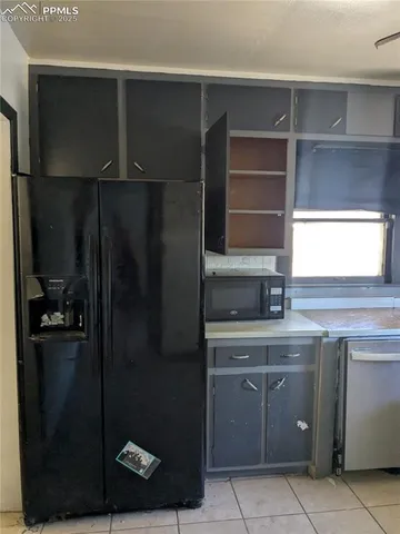 a kitchen with a cabinets and a stove