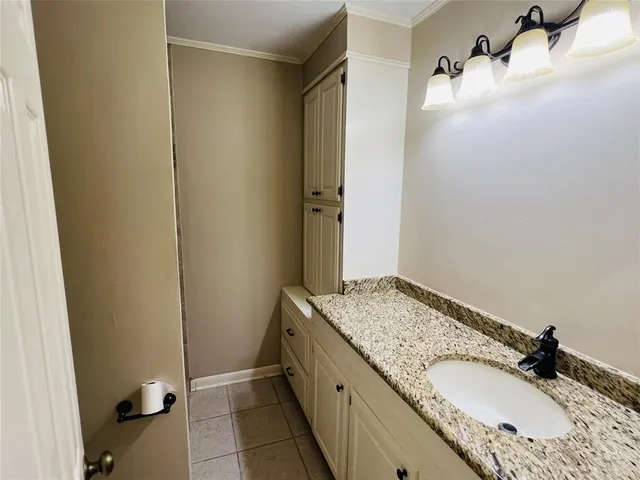 a bathroom with a toilet and shower