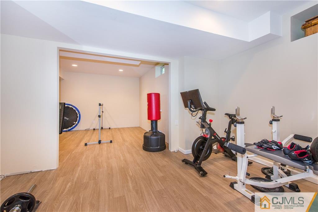 16 Ron's Edge Road Springfield, NJ 07081 - Photo 19 of 25 a view of a room with gym equipment