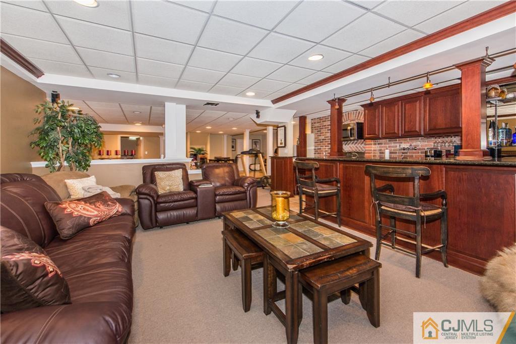 16 Ron's Edge Road Springfield, NJ 07081 - Photo 20 of 25 a living room with furniture kitchen view and a large window