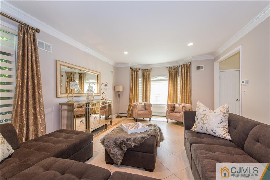 16 Ron's Edge Road Springfield, NJ 07081 - Photo 5 of 25 a living room with furniture and a window