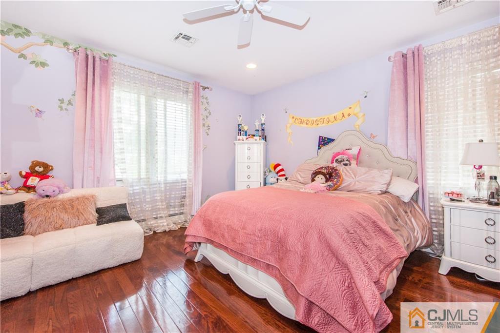 16 Ron's Edge Road Springfield, NJ 07081 - Photo 10 of 25 a bedroom with a bed and a couch