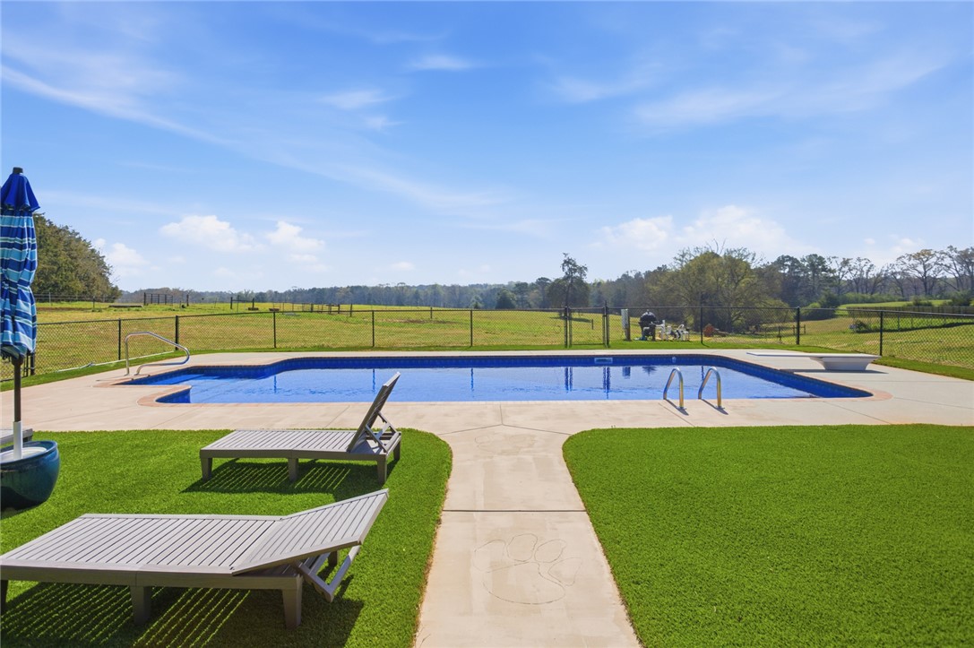 426 Oak Creek Road Seneca, SC 29678 - Photo 35 of 50 An inviting backyard oasis offers ample space for relaxation and enjoyment under the open sky.