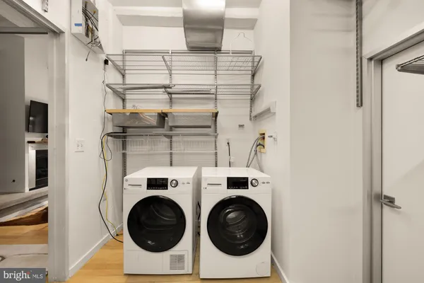 a utility room with dryer and washer