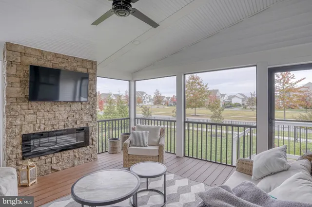 a bathroom with a tub a sink and mirror
