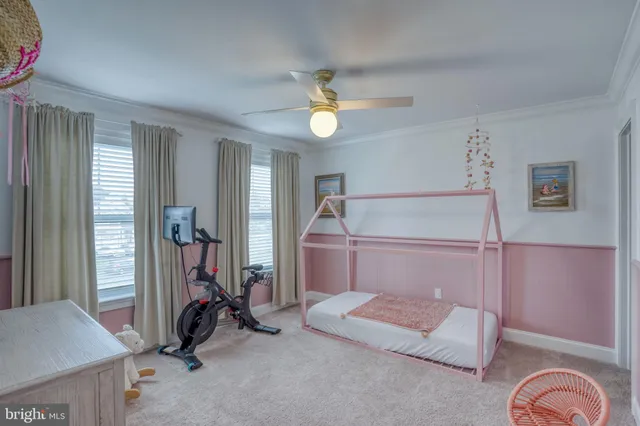 an aerial view of a house with a garden