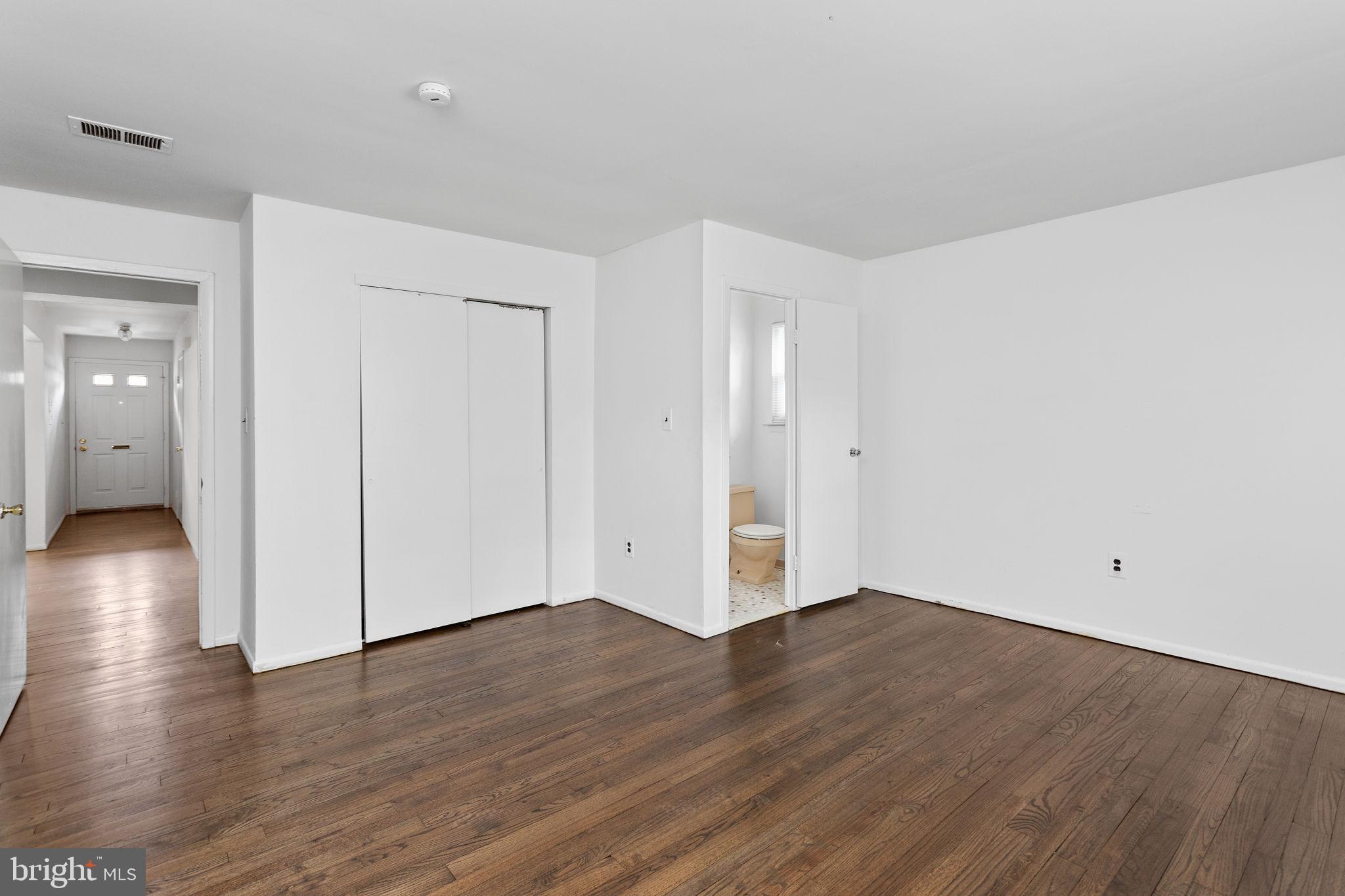 615 Silver Court Hamilton, NJ 08690 - Photo 13 of 22 a view of an empty room with wooden floor
