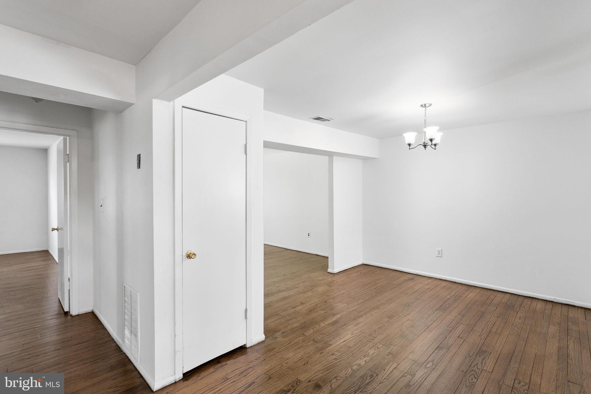 615 Silver Court Hamilton, NJ 08690 - Photo 4 of 22 an empty room with wooden floor