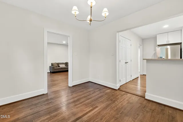 a view of livingroom with hardwood floor and a ceiling fan