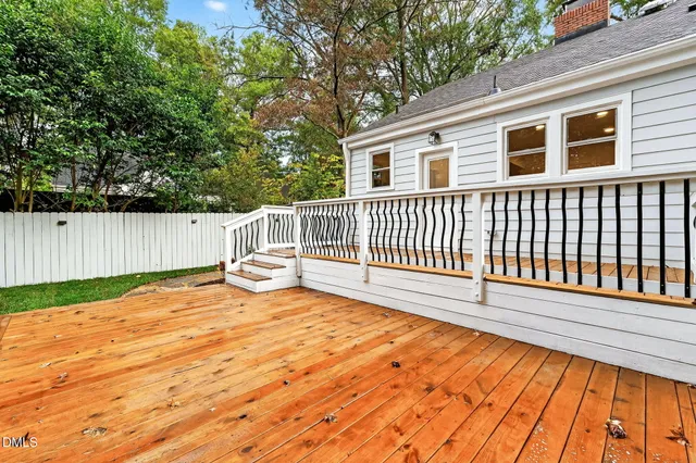 a view of a backyard with a deck