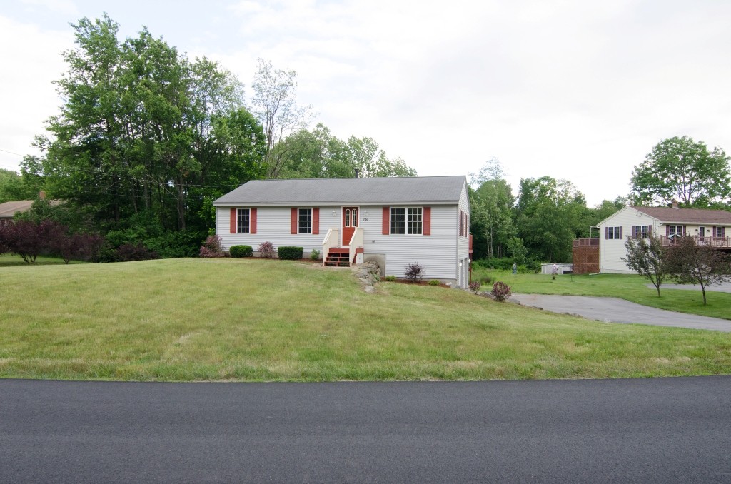 161 Hardwick Road Barre, MA 01005 - Photo 1 of 21 a front view of a house with a yard
