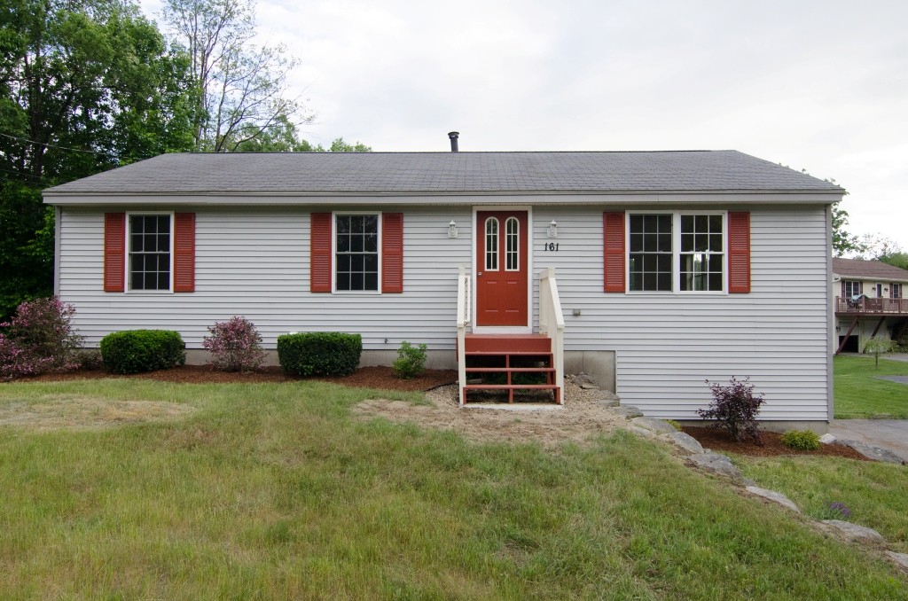 161 Hardwick Road Barre, MA 01005 - Photo 2 of 21 a front view of a house with a garden