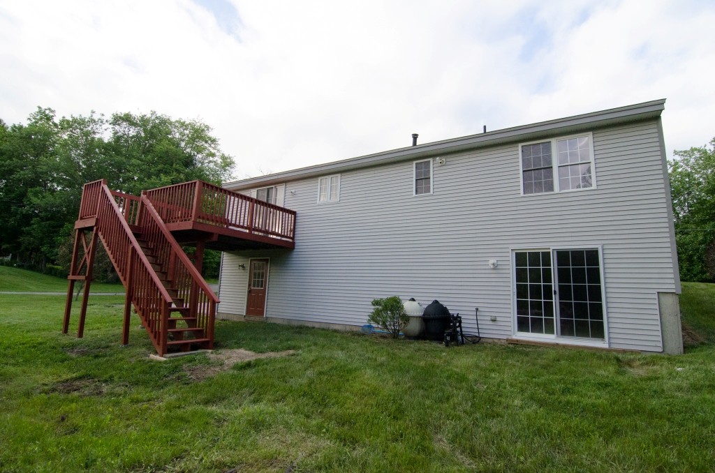 161 Hardwick Road Barre, MA 01005 - Photo 3 of 21 a view of a backyard with a slide and a slide