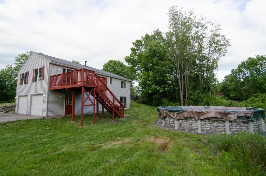 161 Hardwick Road Barre, MA 01005 - Photo 4 of 21 a view of a house with a yard and sitting area