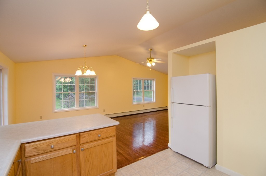 161 Hardwick Road Barre, MA 01005 - Photo 9 of 21 a kitchen with a refrigerator and window