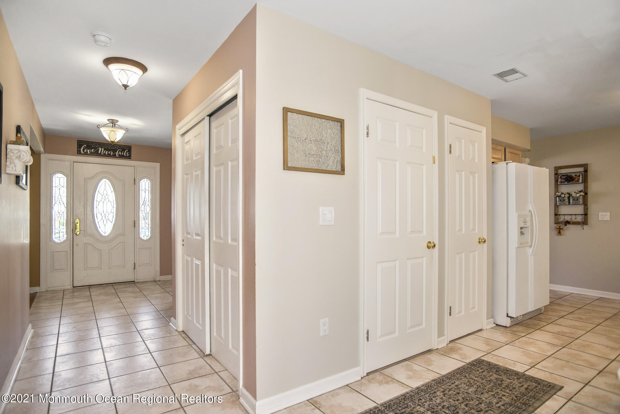 39 Sally Street Howell, NJ 07731 - Photo 11 of 70 a view of a hallway with closet and bathroom