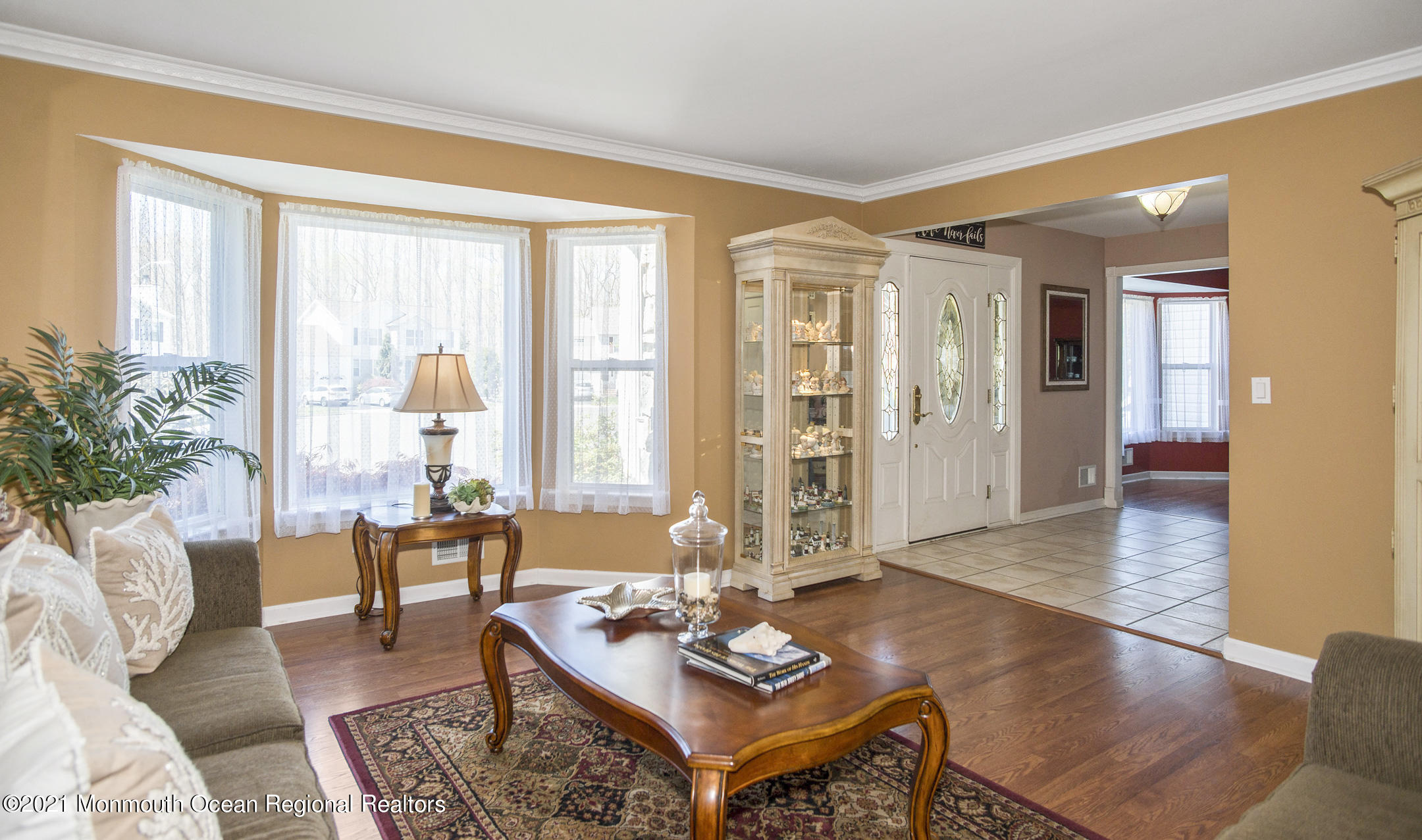 39 Sally Street Howell, NJ 07731 - Photo 16 of 70 a living room with furniture and large windows