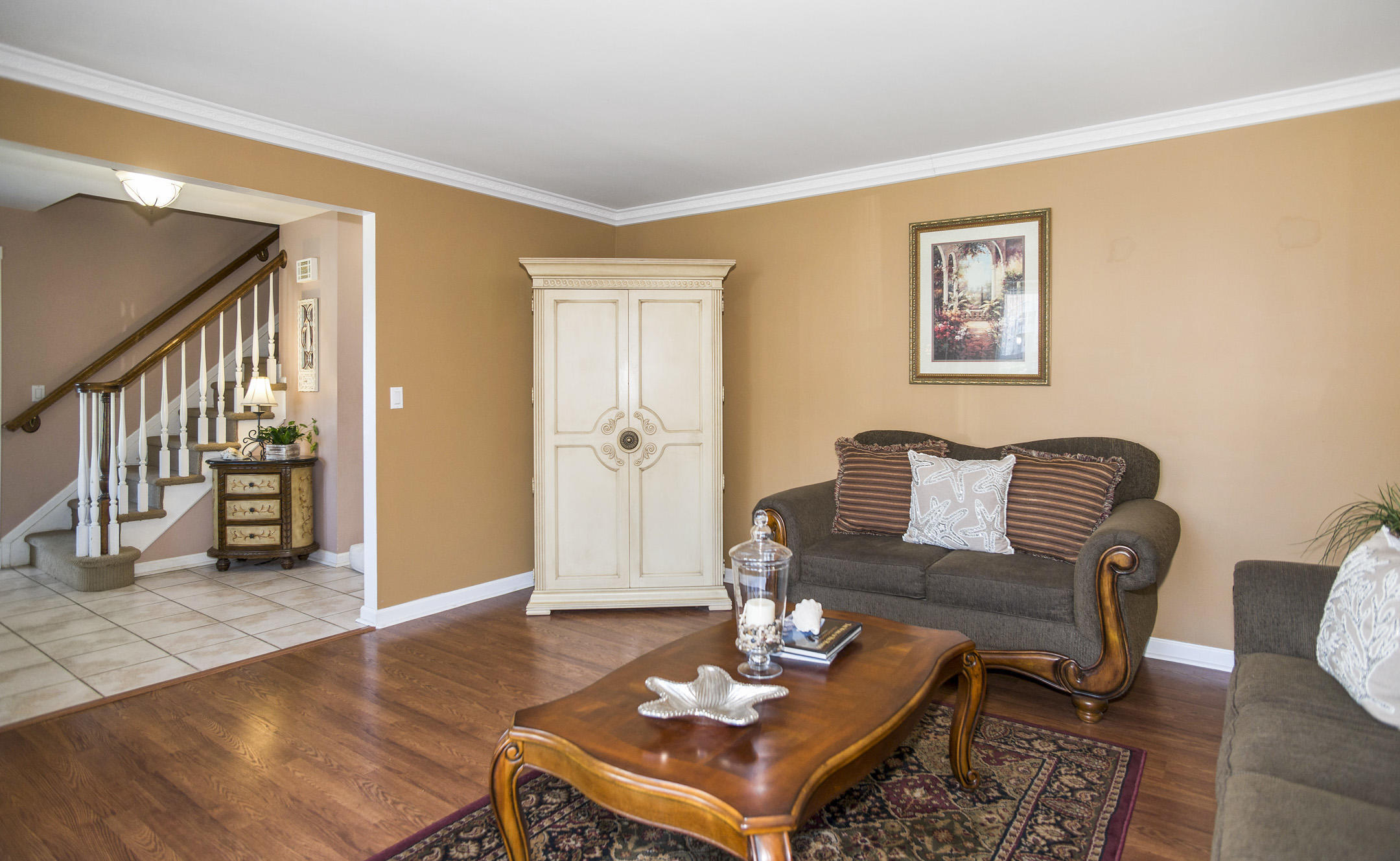 39 Sally Street Howell, NJ 07731 - Photo 17 of 70 a living room with furniture and wooden floor