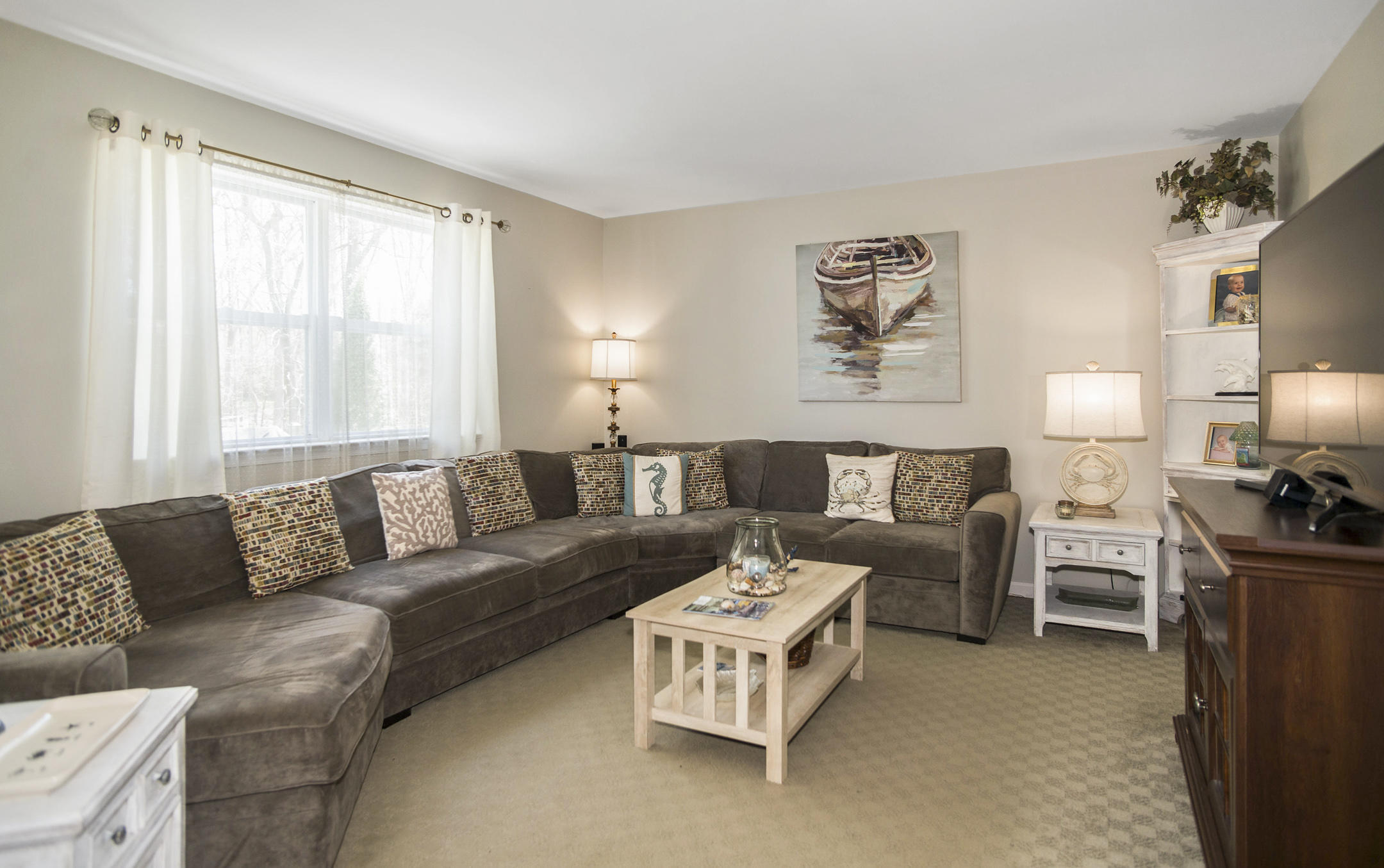 39 Sally Street Howell, NJ 07731 - Photo 21 of 70 a living room with furniture and a large window