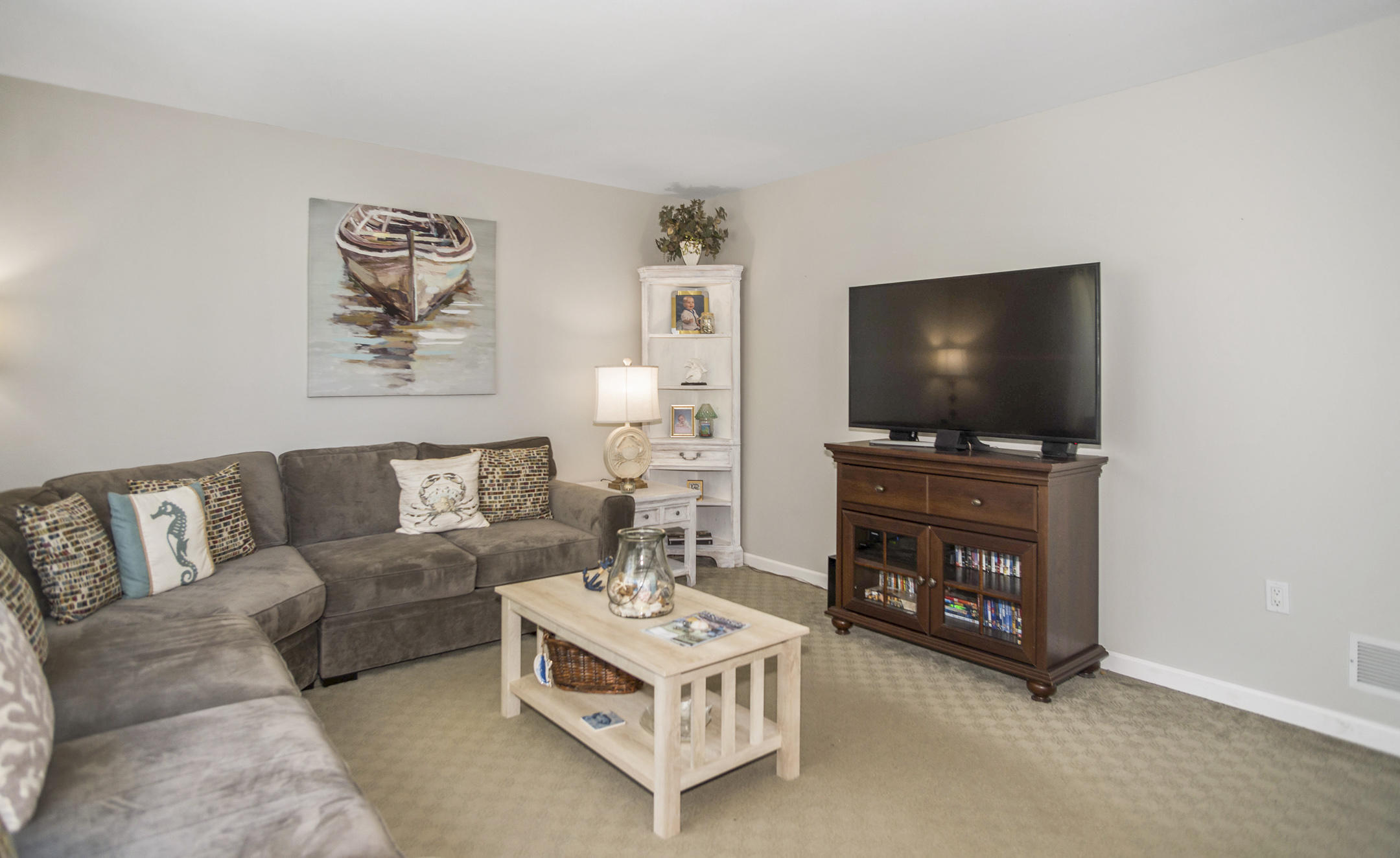 39 Sally Street Howell, NJ 07731 - Photo 22 of 70 a living room with furniture and a flat screen tv