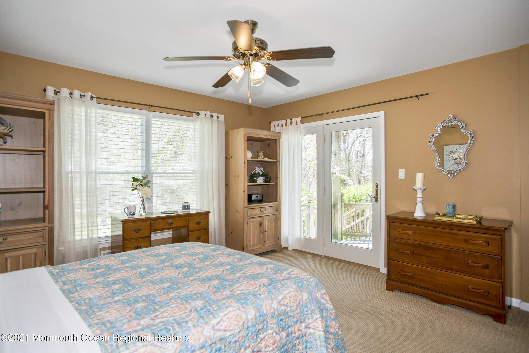 39 Sally Street Howell, NJ 07731 - Photo 32 of 70 a bedroom with a bed and wooden floor