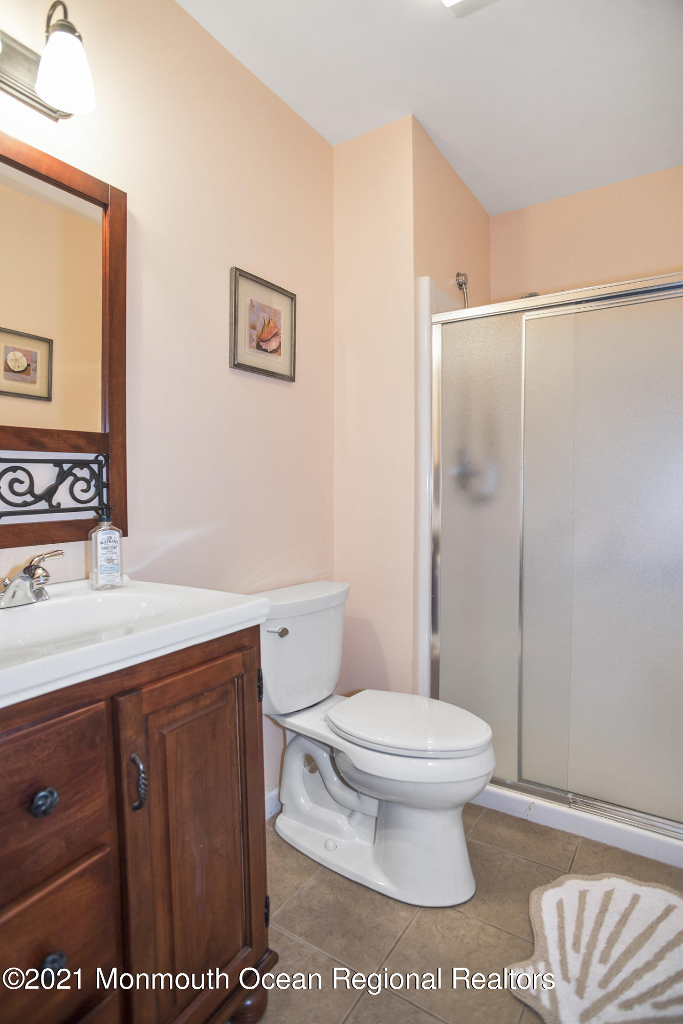 39 Sally Street Howell, NJ 07731 - Photo 35 of 70 a bathroom with a toilet sink and mirror