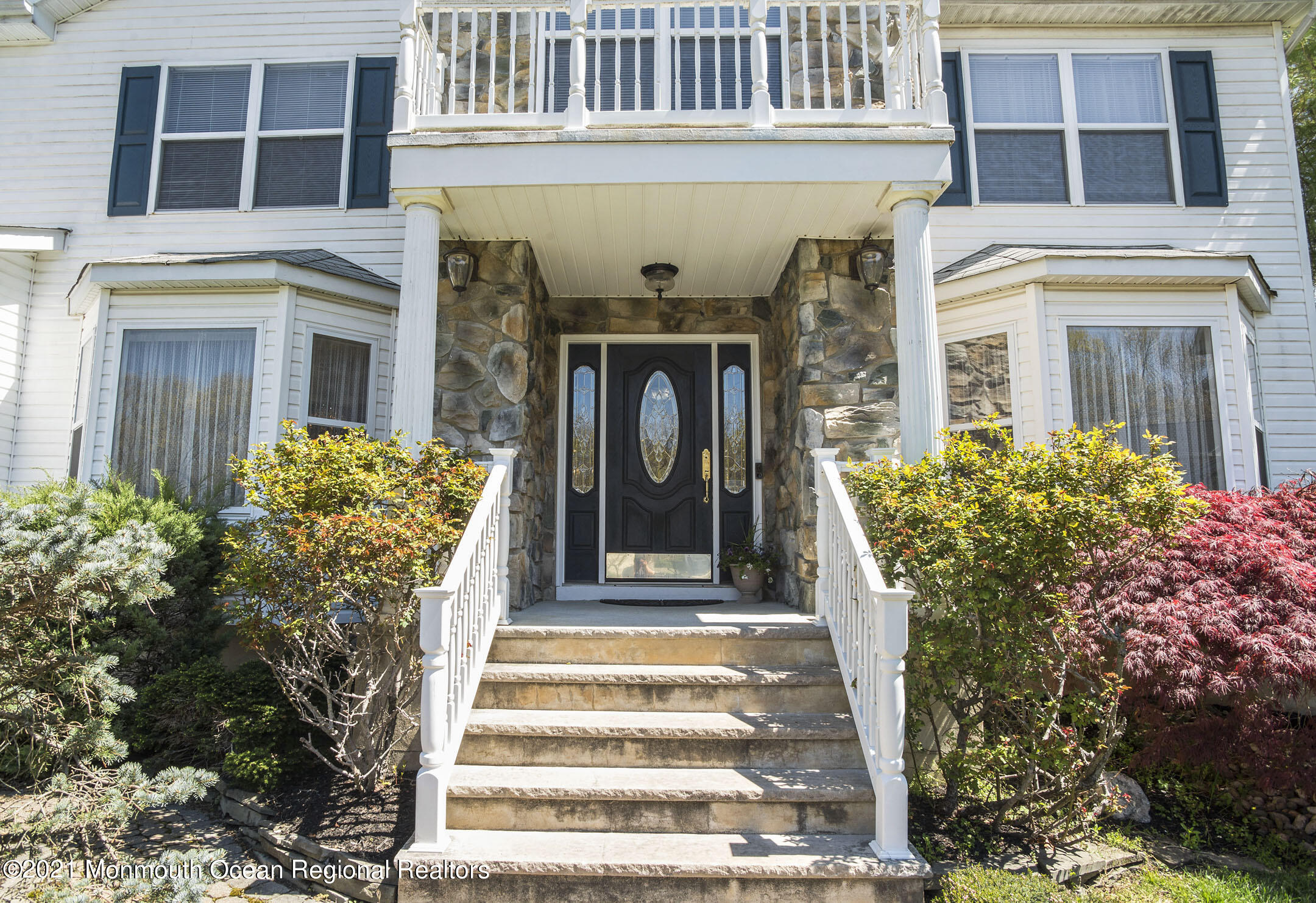 39 Sally Street Howell, NJ 07731 - Photo 5 of 70 a front view of a house with a garden