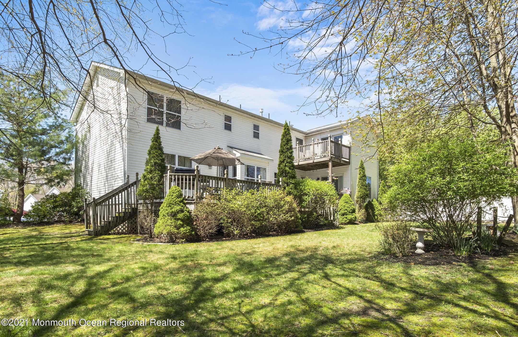 39 Sally Street Howell, NJ 07731 - Photo 63 of 70 a front view of a house with a yard