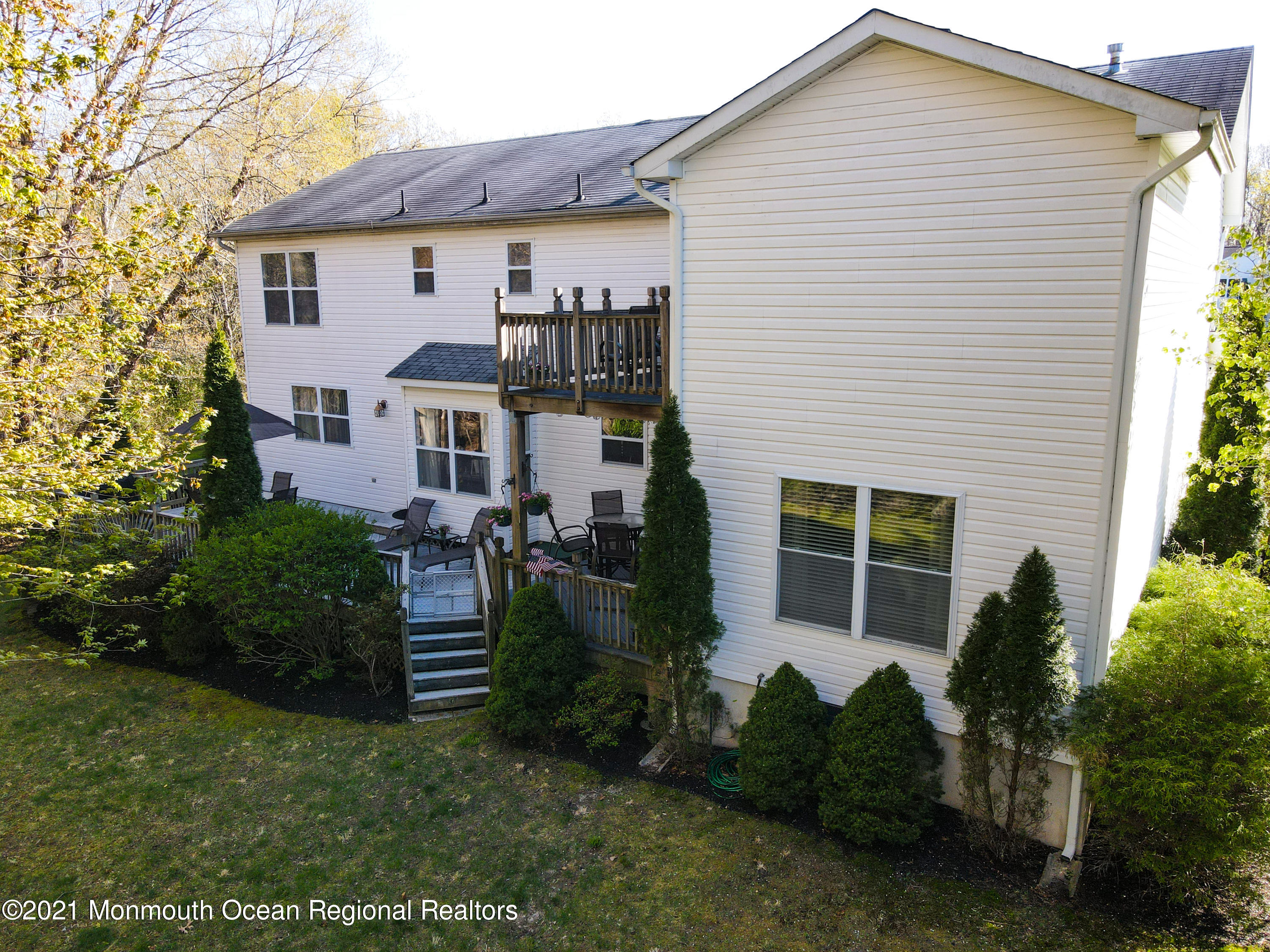 39 Sally Street Howell, NJ 07731 - Photo 64 of 70 a front view of a house with a garden