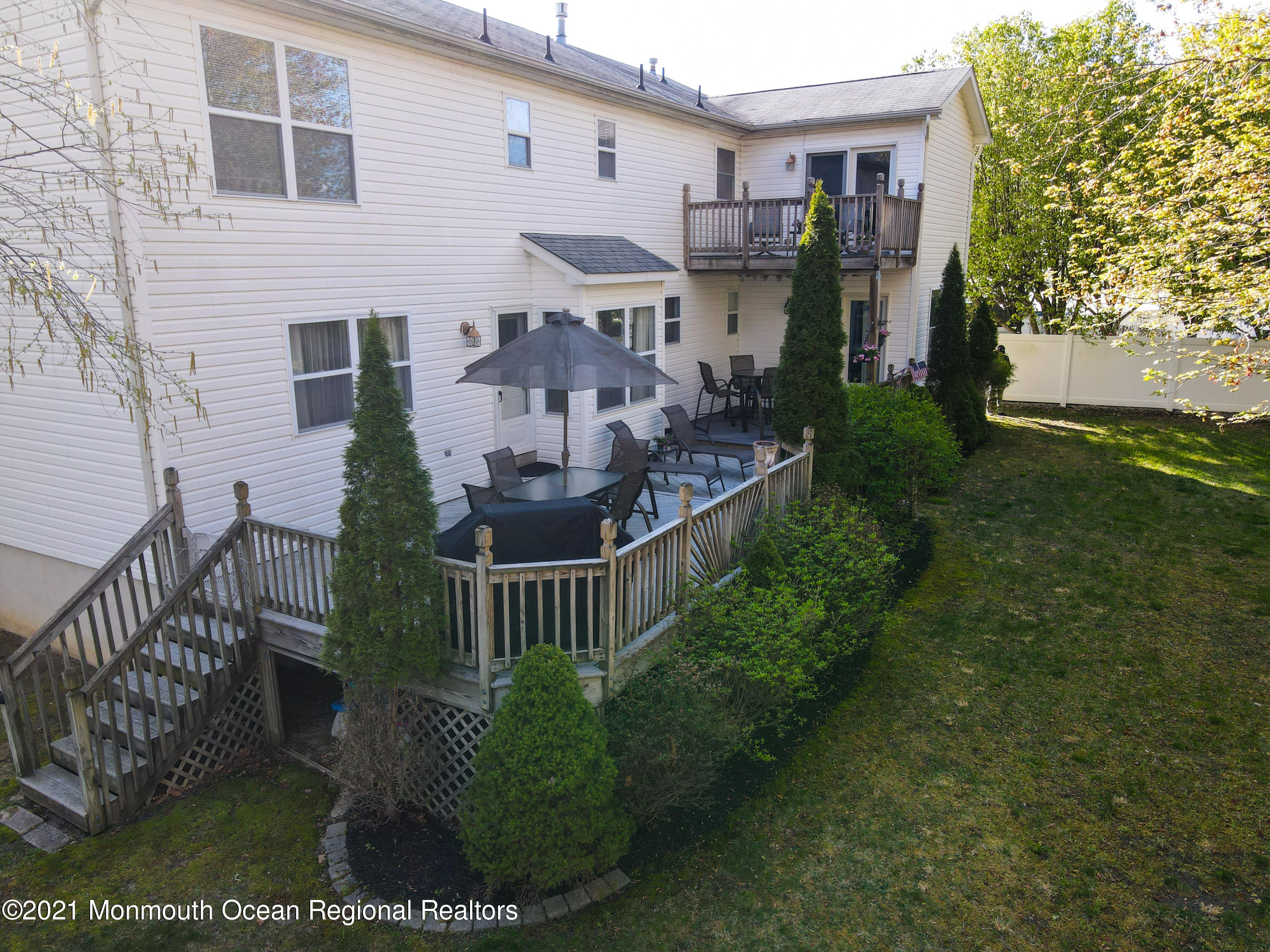 39 Sally Street Howell, NJ 07731 - Photo 68 of 70 a front view of a house with yard and green space