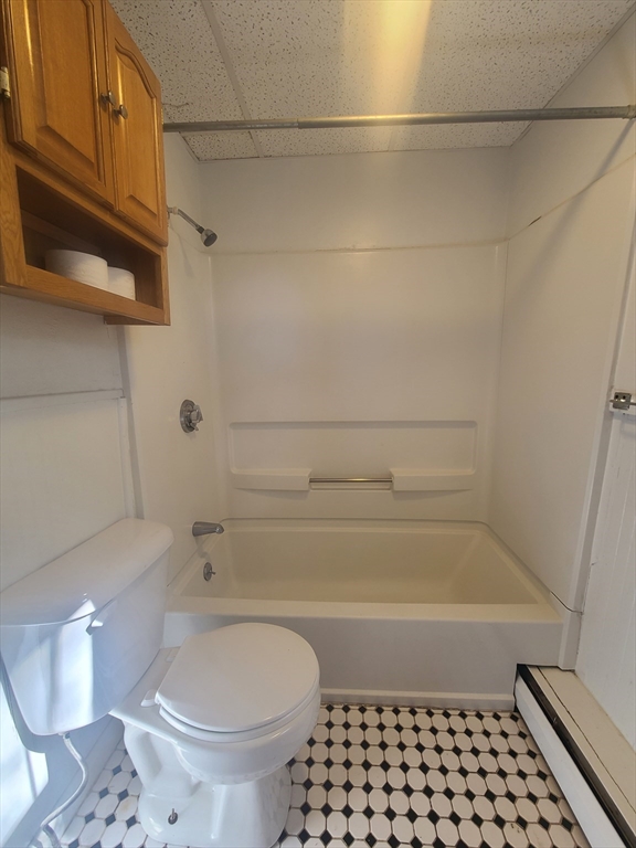 39 Florence Street, Unit 2 Worcester, MA 01610 - Photo 6 of 10 a bathroom with a toilet and a shower