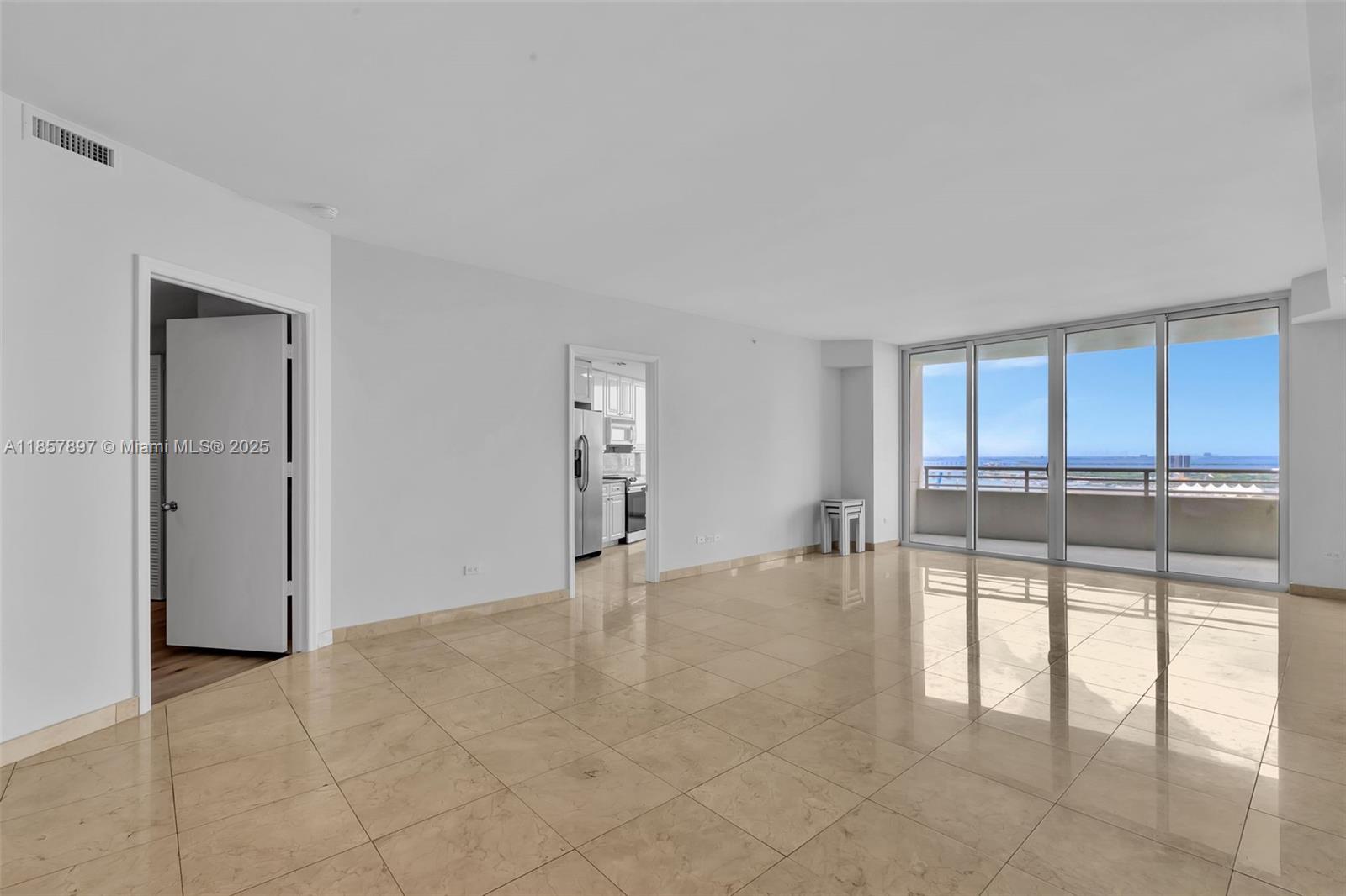 848 Brickell Key Drive, Unit 2602 Miami, FL 33131 - Photo 11 of 40 a view of an empty room with a window