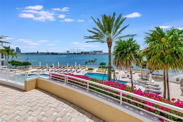 a outdoor space with pool and furniture