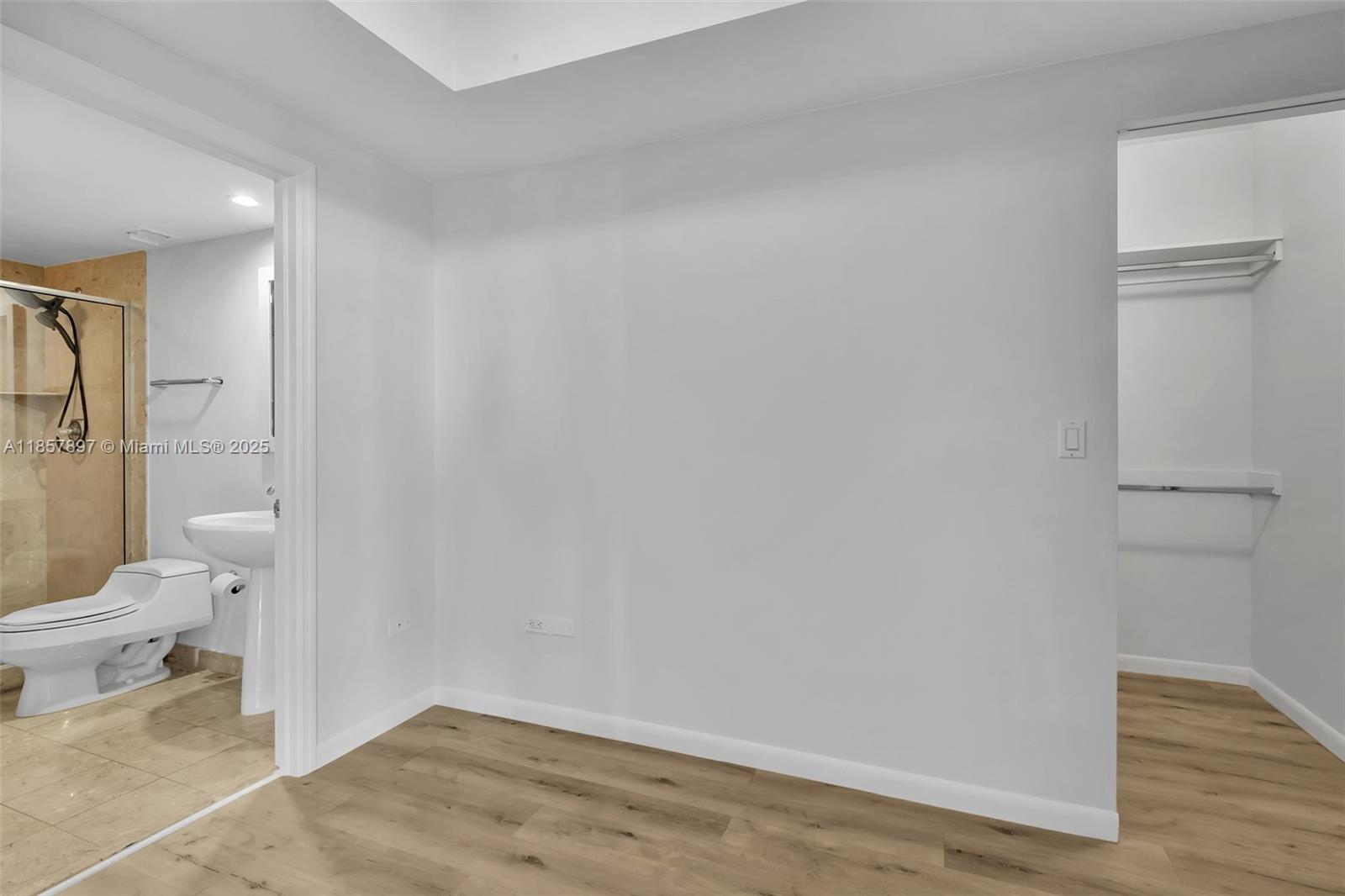 848 Brickell Key Drive, Unit 2602 Miami, FL 33131 - Photo 27 of 40 a bathroom with a toilet and a shower