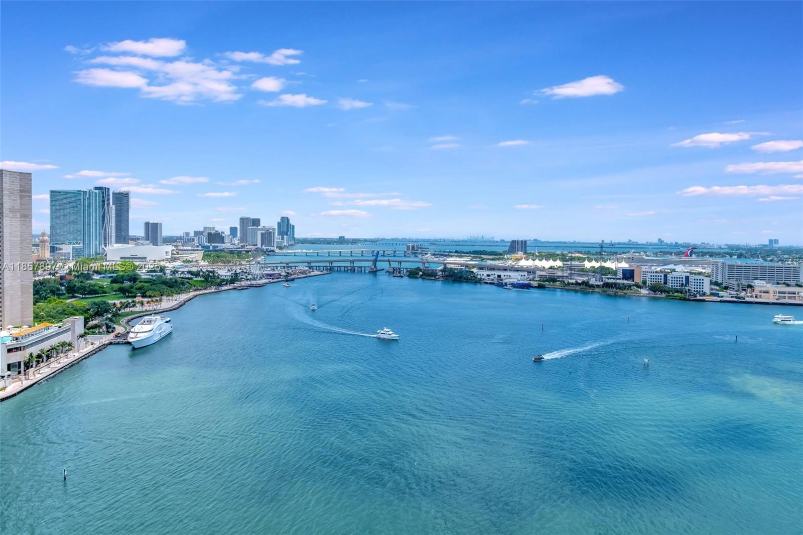 848 Brickell Key Drive, Unit 2602 Miami, FL 33131 - Photo 37 of 40 a view of a city with lots of residential buildings and ocean view