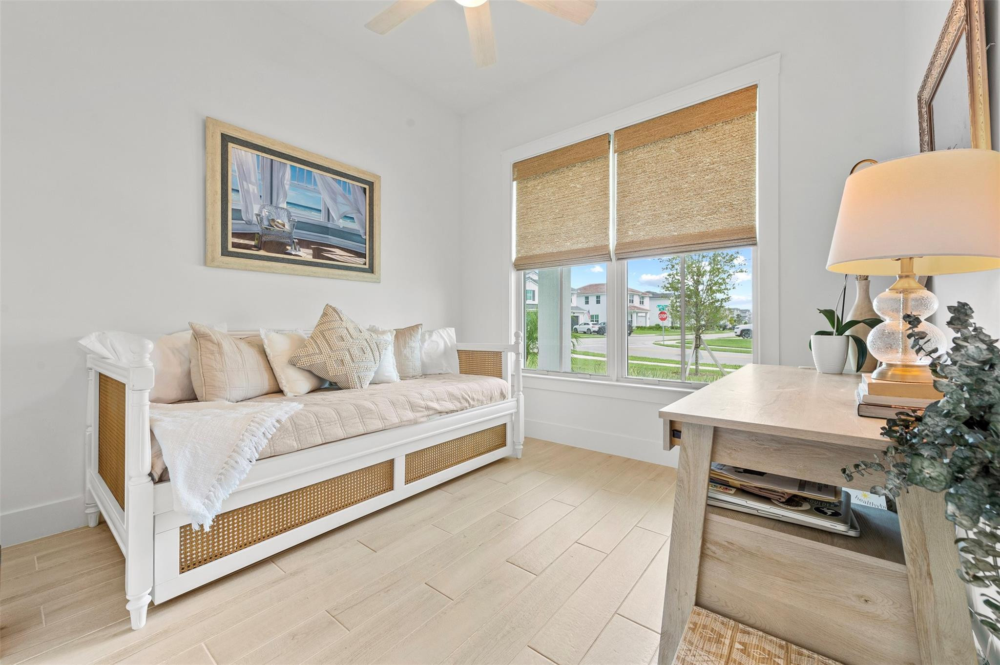 121 Southeast Rocky Terrace Stuart, FL 34997 - Photo 26 of 45 a living room with furniture and a large window