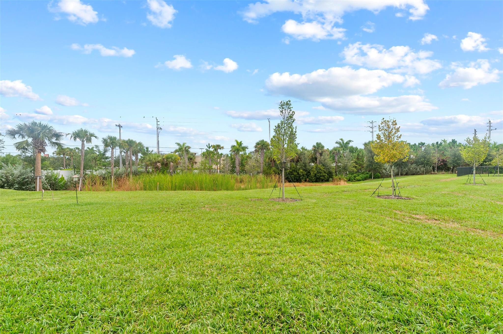 121 Southeast Rocky Terrace Stuart, FL 34997 - Photo 39 of 45 a view of a field with clear sky