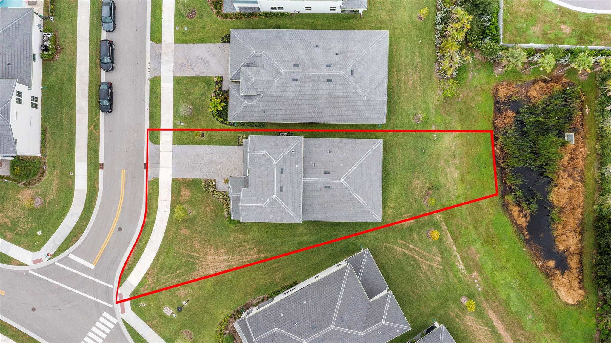 121 Southeast Rocky Terrace Stuart, FL 34997 - Photo 42 of 45 swimming pool view with a garden and plants