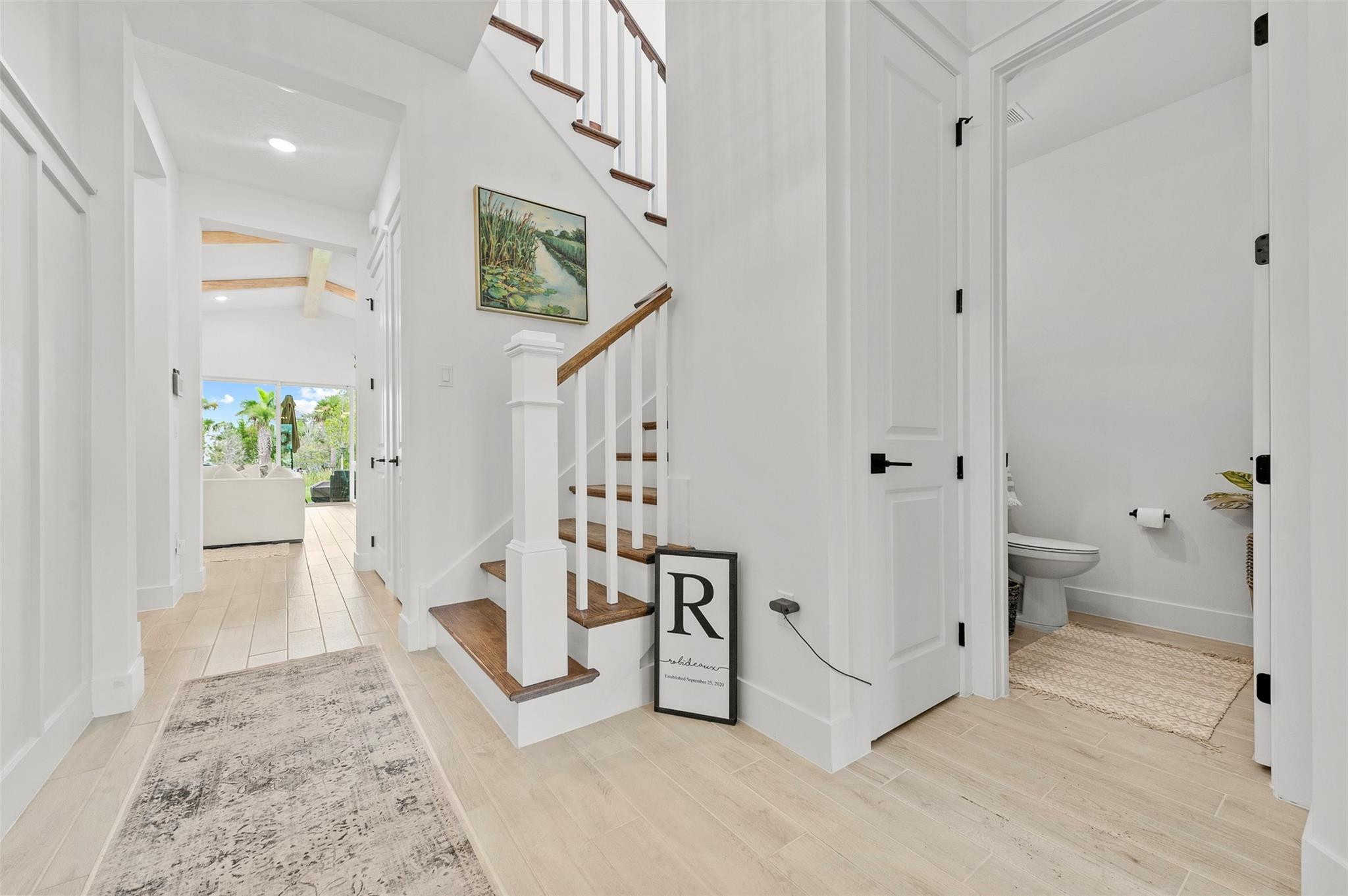 121 Southeast Rocky Terrace Stuart, FL 34997 - Photo 5 of 45 a spacious bathroom with a tub and shower