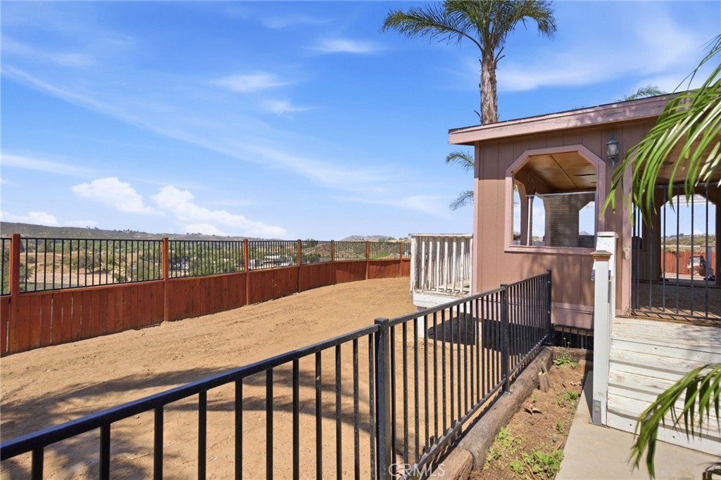 40100 Owl Valley Road Temecula, CA 92592 - Photo 34 of 44 a balcony with view of swimming pool