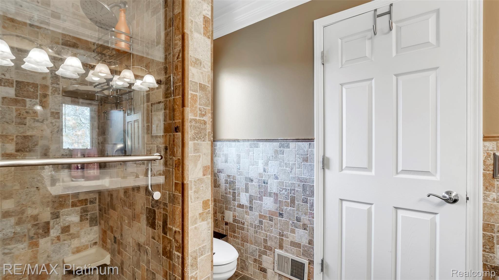 2439 Sunny Ridge Drive Pinckney, MI 48169 - Photo 24 of 42 Private Commode Area In The Master Bath