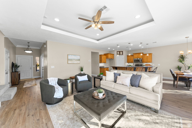 1570 South Rio Virgin Drive Washington, UT 84780 - Photo 11 of 71 Living room featuring light wood-type flooring, a ceiling fan, and hanging lights