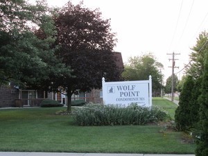 19380 Wolf Road, Unit 9 Mokena, IL 60448 - Photo 2 of 13 a sign on the side of the road