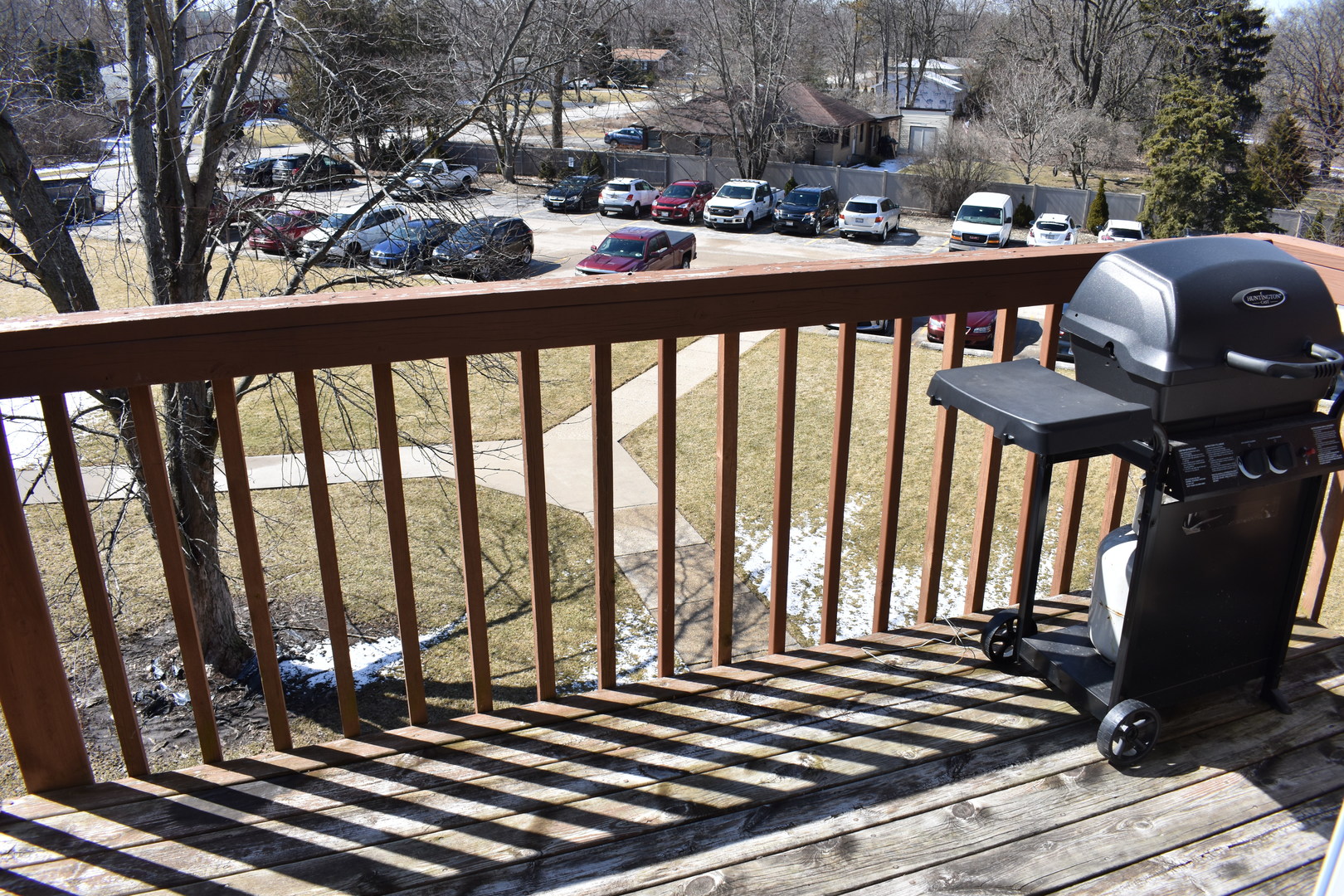 19380 Wolf Road, Unit 9 Mokena, IL 60448 - Photo 3 of 13 a view of a balcony and yard with furniture